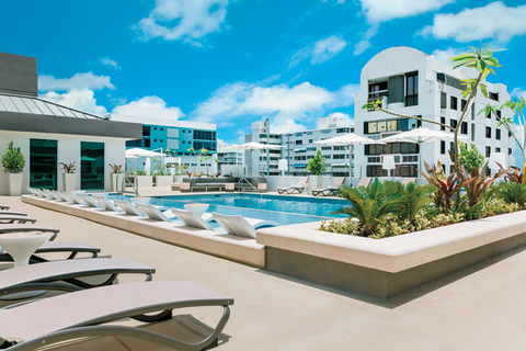 AC Hotel San Juan Condado The rooftop pool area at AC Hotel San Juan Condado includes a deck with poolside service.